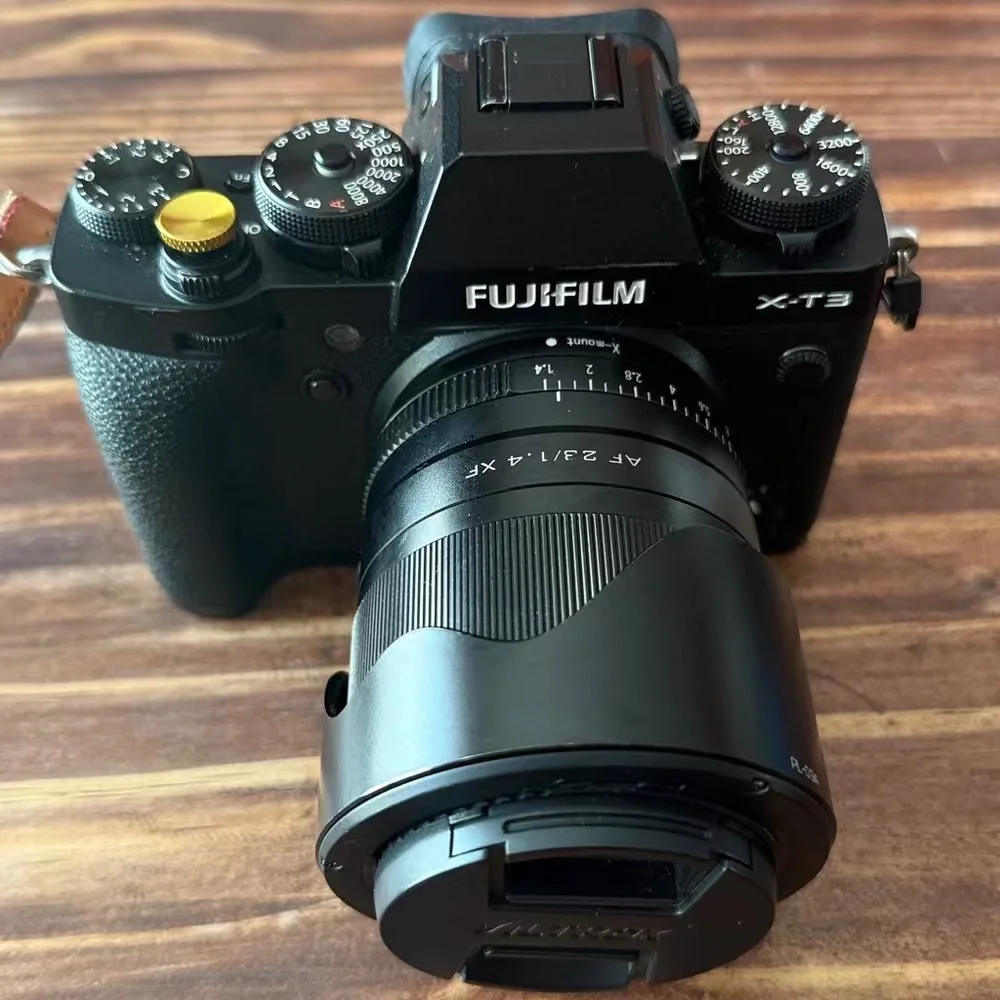 Fujifilm X-T3 Black Mirrorless Camera with Black XF Lens and Gold Accent